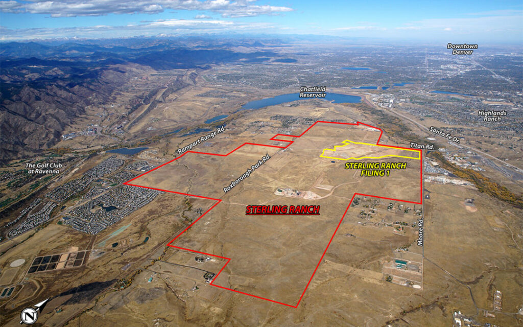 Aerial view of Sterling Ranch Colorado land boundaries outlined in red, with Sterling Ranch Filing 1 highlighted in yellow, and nearby roads, reservoir, and developments visible near Littleton CO in the Denver metro area.